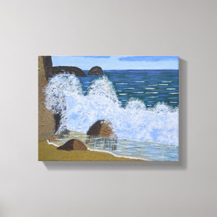 A wave breaking on the beach canvas print