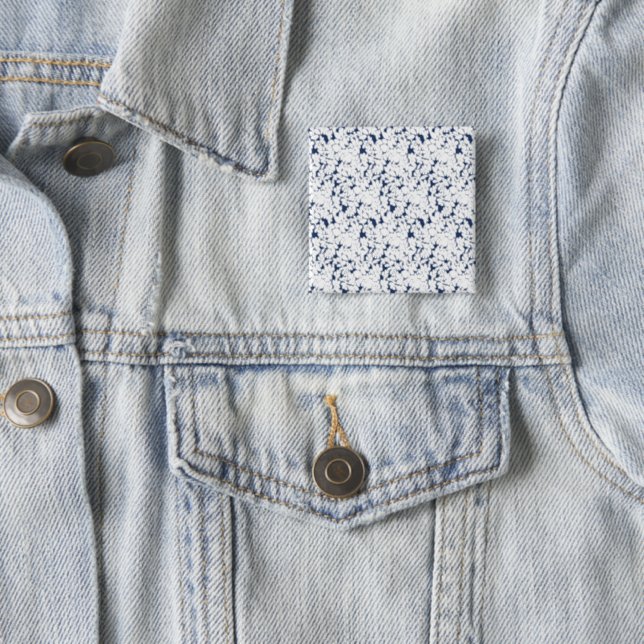 a white and blue background with a pattern 2 inch square button (In Situ)