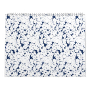 a white and blue background with a pattern calendar
