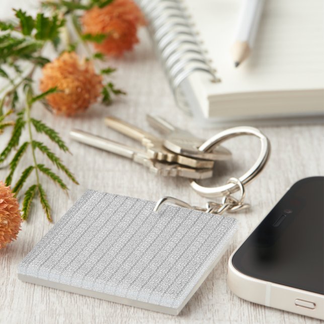A white and grey geometric pattern fills the image keychain (Front Right)