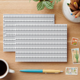 a white background with a pattern of circles envelope