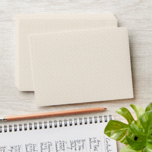 a white background with a pattern of small dots envelope