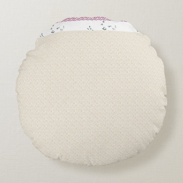 a white background with a pattern of small dots round pillow (Front)