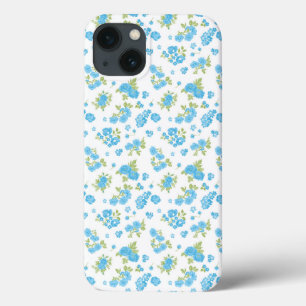 a white background with blue flowers and green lea iPhone 13 case