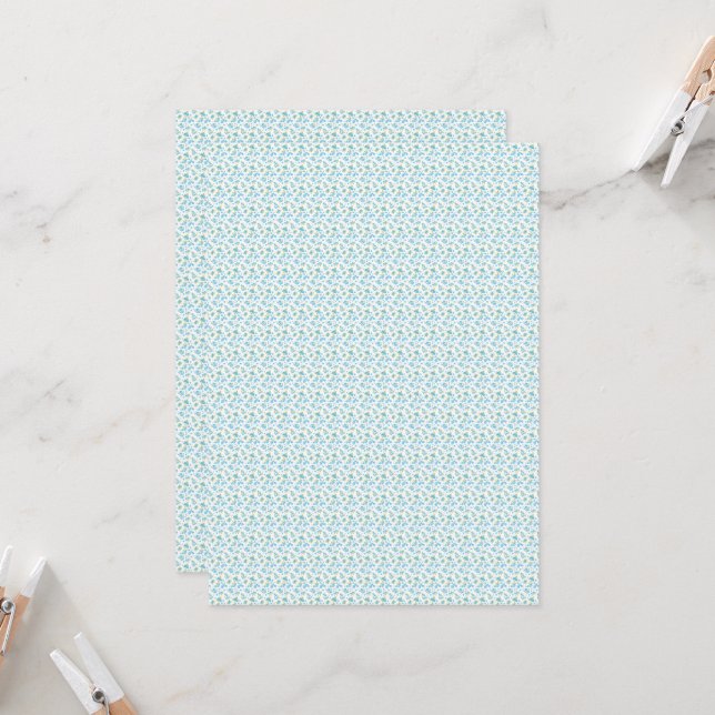 a white background with blue flowers and green lea invitation (Front/Back In Situ)