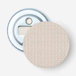 a white background with brown dots on it bottle opener