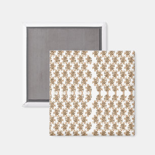 a white background with brown flowers on it magnet