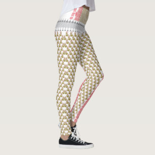 a white background with green leaves on it leggings
