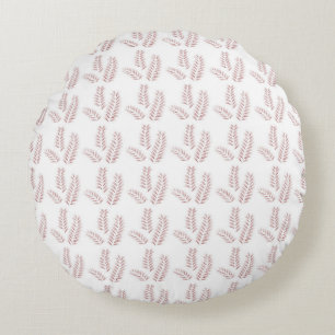 a white background with pink leaves on it round pillow