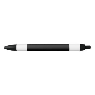 A white clock displayed prominently against a soli black ink pen