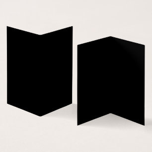 A white full moon shines brightly against a dark n