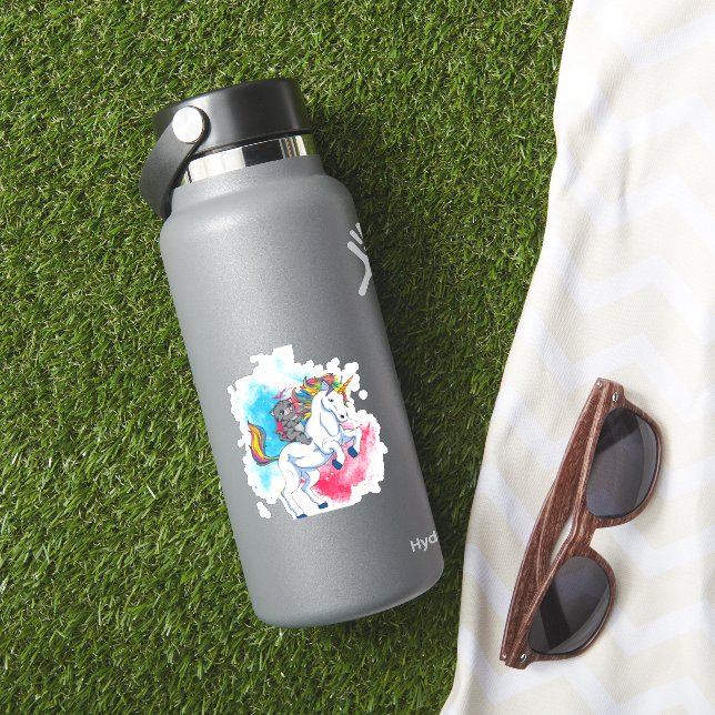 A white unicorn with rainbow tail which is ridden (HydroFlask Insitu)
