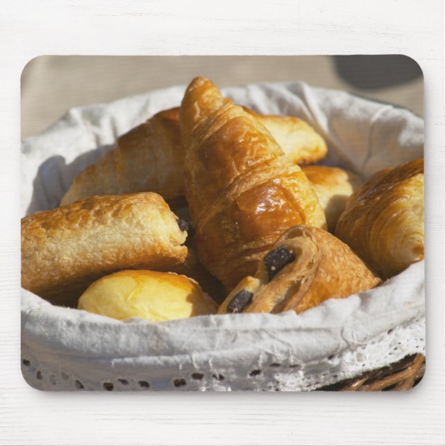 A wicker breakfast basket with croissants, and mouse pad (Front)