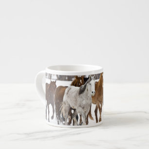 A winter scenic of running espresso cup