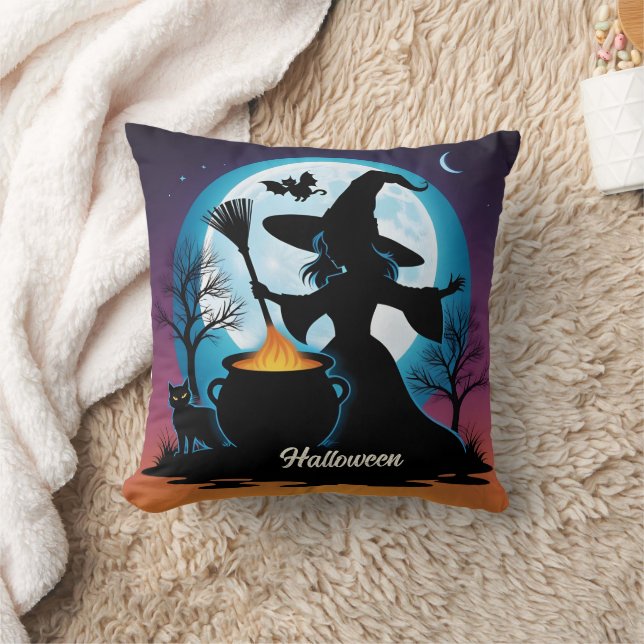 A witch brews up magic under a full moon throw pillow (Blanket)