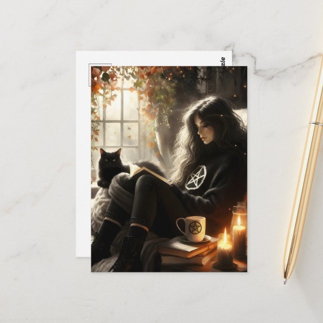 A witch reads with her black cat in a cozy chair postcard (Front/Back In Situ)
