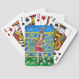 A woman dressed in traditional attire playing cards