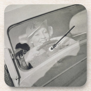 A woman driving, c.1930s (photogravure) coaster