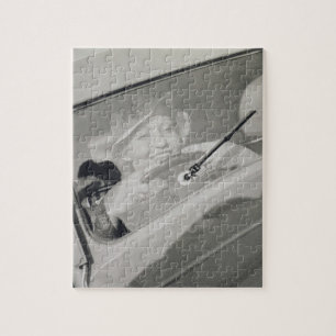 A woman driving, c.1930s (photogravure) jigsaw puzzle