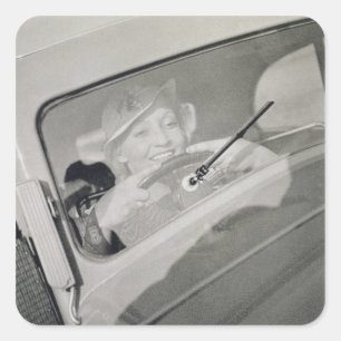 A woman driving, c.1930s (photogravure) square sticker