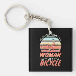 A Woman On A Bicycle Keychain