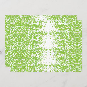 A woman wearing a grey sweater and glasses sits by invitation