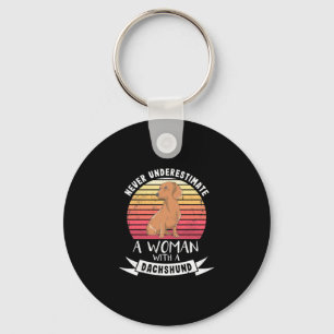 A Woman With A Dachshund Keychain