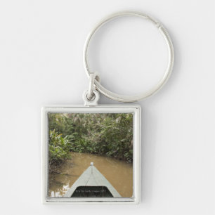 A wooden canoe made of Eucylptus tree floats in 2 Keychain