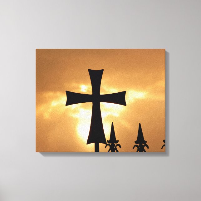 A Wrought-iron Cross on a Fence Canvas Print (Front)
