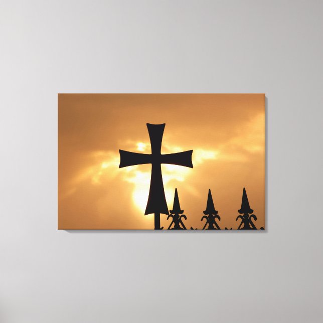 A Wrought-iron Cross on a Fence Canvas Print (Front)