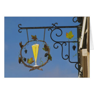 A wrought iron sign that illustrates the theme