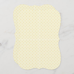 a yellow and white background with small circles