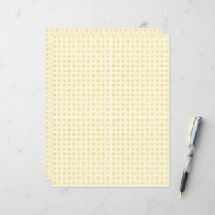 a yellow and white background with small circles
