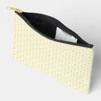 a yellow and white background with small circles