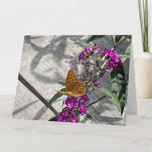 A yellow butterfly card