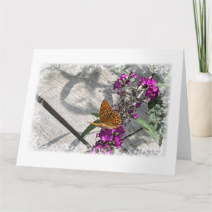 A yellow butterfly card