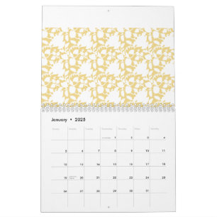 A yellow rug with a repeating motif pattern resemb calendar