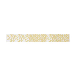 A yellow rug with a repeating motif pattern resemb invitation belly band