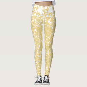 A yellow rug with a repeating motif pattern resemb leggings