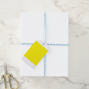 A yellow square centred on a clean white backgrou gift tags