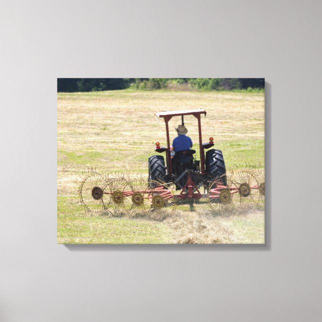 A young boy driving a tractor harvesting canvas print (Front)