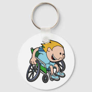 A young boy racing in a wheelchair keychain