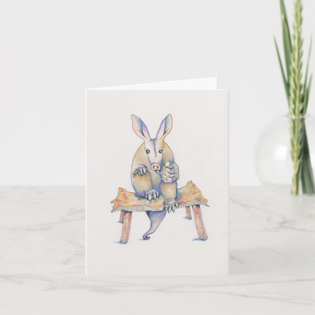 Aardvark sitting on stool enjoying a drink card (Front)