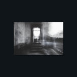 Abandoned Staircase Ghostly Doorway Blur Canvas Print<br><div class="desc">A wide stone staircase rises toward an open arched doorway in an abandoned grand interior, captured in stark black and white. Thick motion blur and ghostly double-exposure layers overlap walls, steps, and cracked plaster, creating an ethereal, dreamlike veil across the scene. Soft daylight pours through the threshold, revealing overgrown foliage...</div>