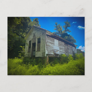 Abandoned Wooden House in Overgrown Field Postcard