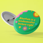 Abortion is a Fundamental Human Right Feminist 2 Inch Round Button<br><div class="desc">Abortion is a fundamental human right written in retro yellow font on a funky hippie style button for a pro choice feminist. Show off your fun spirit with this cute green button with pretty flowers while also standing up for women's rights and the pro-choice movement.</div>
