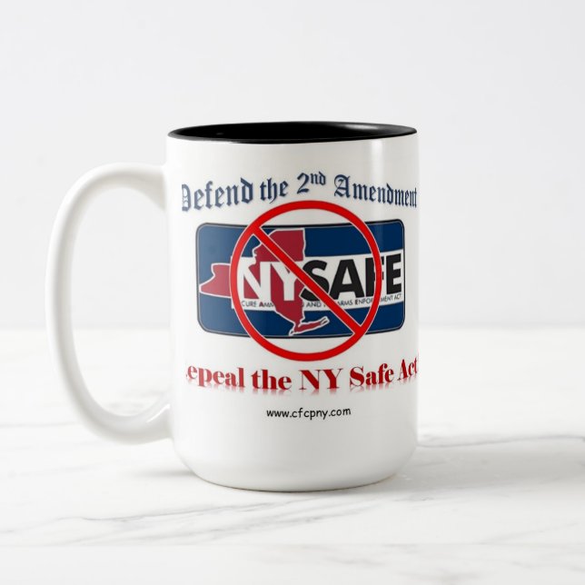Abrogez la tasse sûre de Cofee d'acte de NY (Gauche)