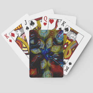 Abstract almonds under showy deformed dark glass playing cards