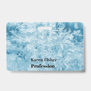 abstract blue feathers and snowflakes badge