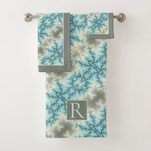 Abstract blue, grey snowflake pattern and monogram bath towel set